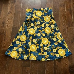 Summer sunburst and leaves skirt mid-length